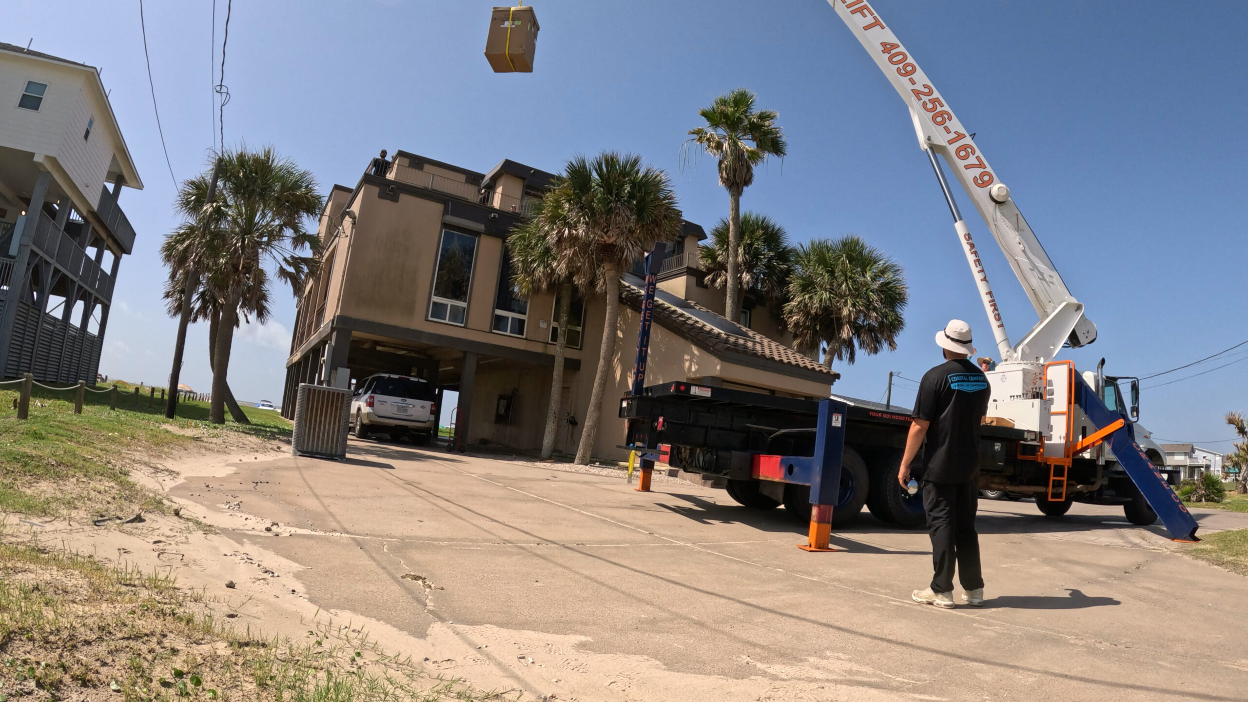 Large-scale HVAC installation with crane