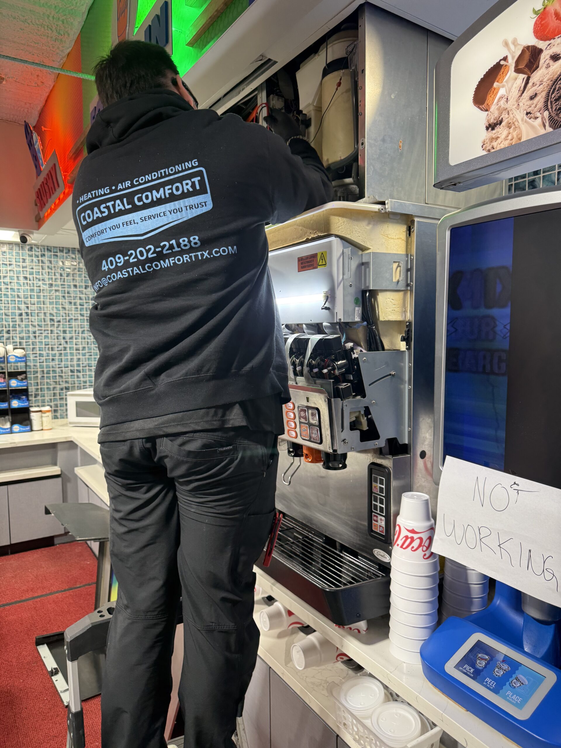 Coastal Comfort tech on ice machine repair