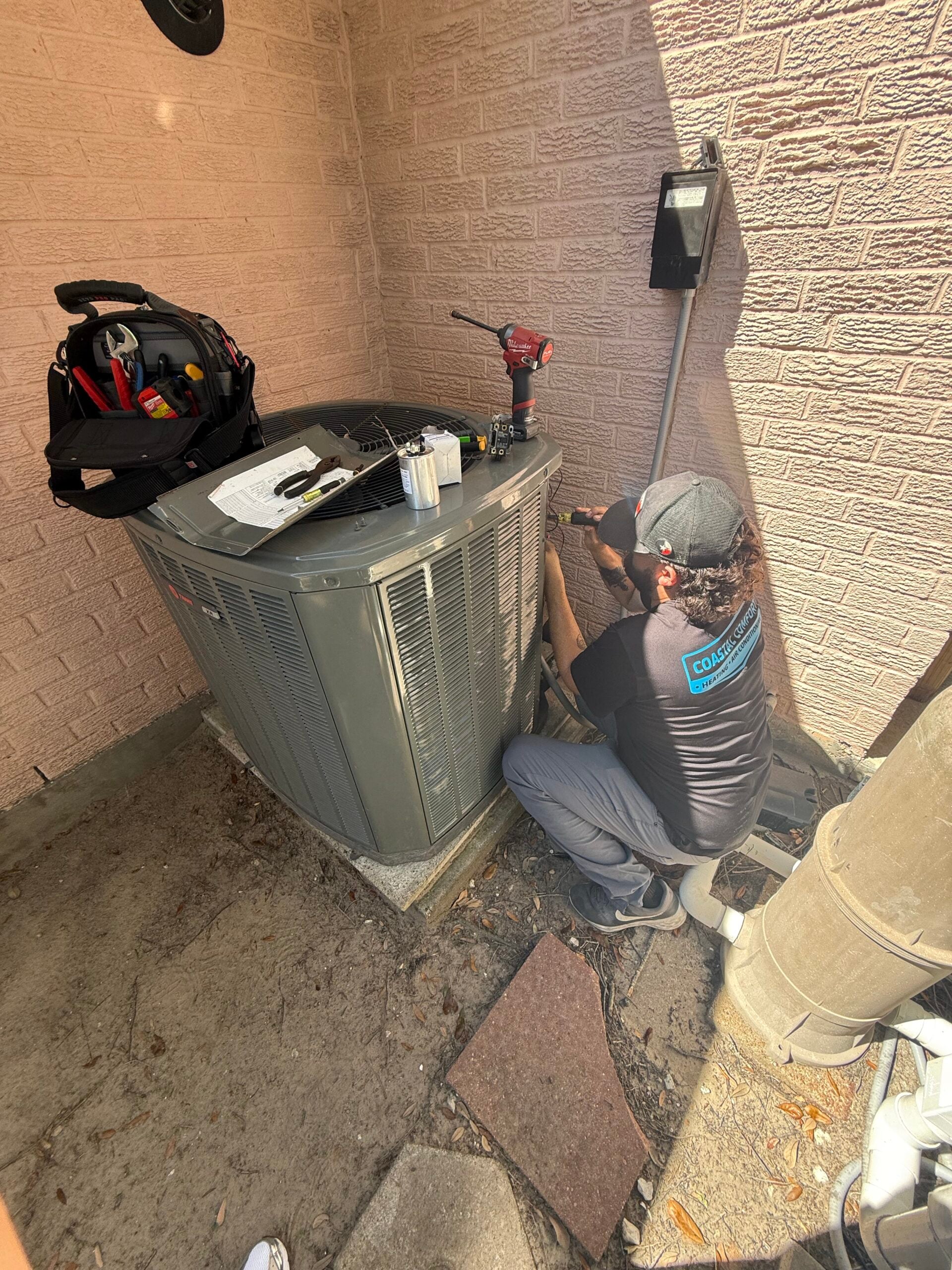 Technician performing Trane unit tune-up